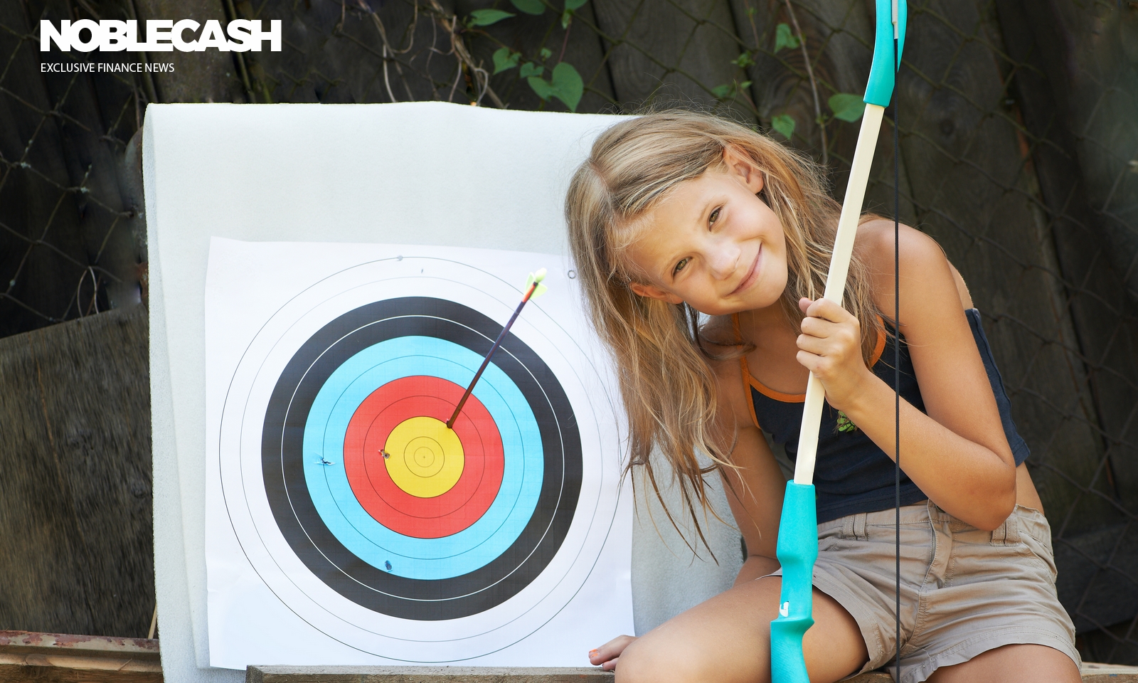 Girl with bow and sports aim